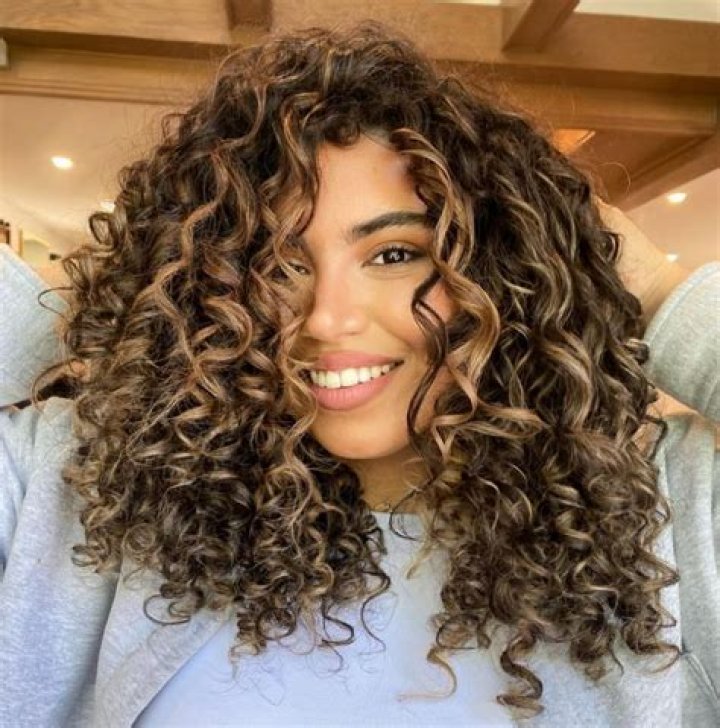 Curly Caramel Balayage: A Trendy Hair Transformation That Defines Elegance and Style